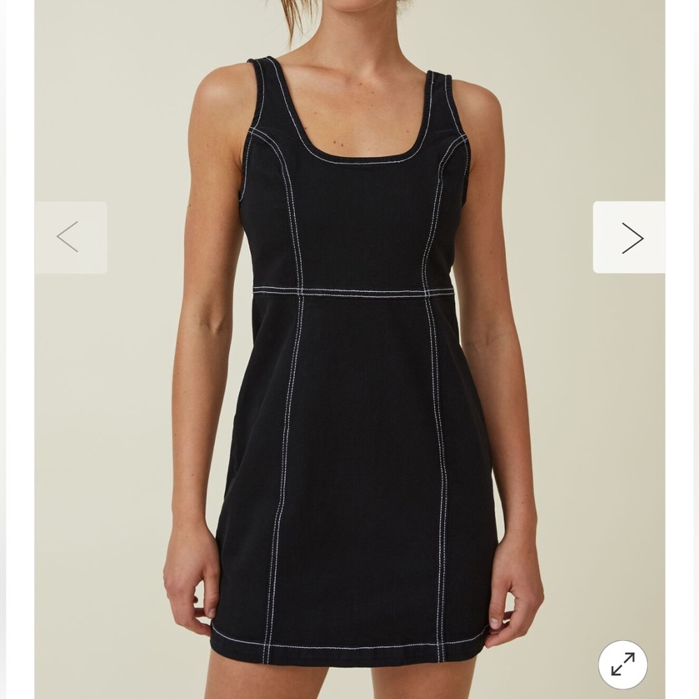 Black Stretch Denim Mini Dress by Cotton On. Size M